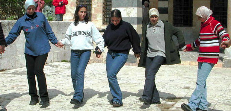 Students dancing in the courtyard of Azem Palace, Hama Syria 2001